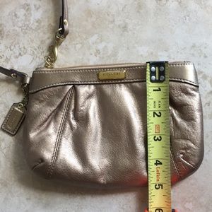 Gold COACH wristlet